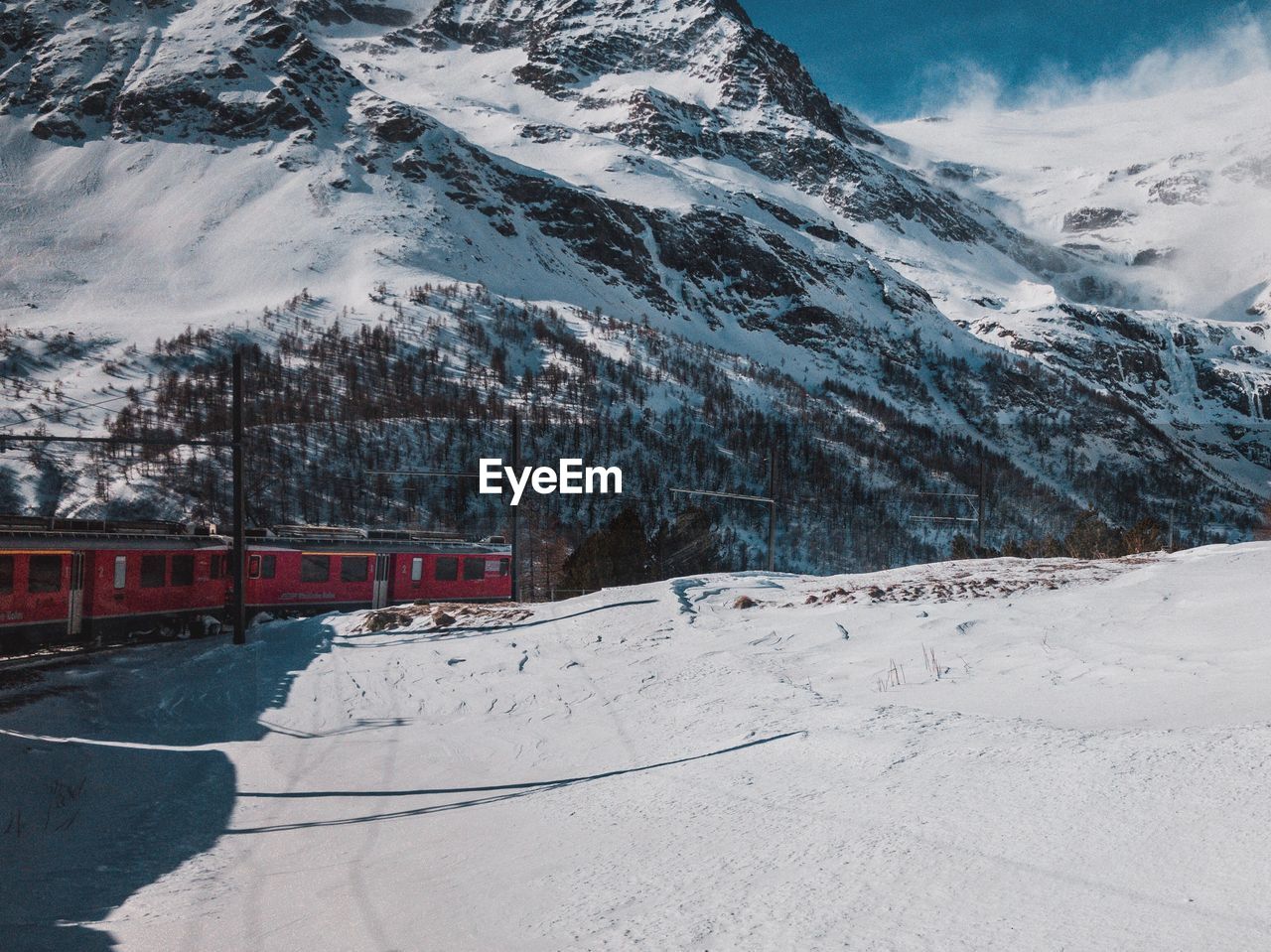 Train passing through snowy landscape