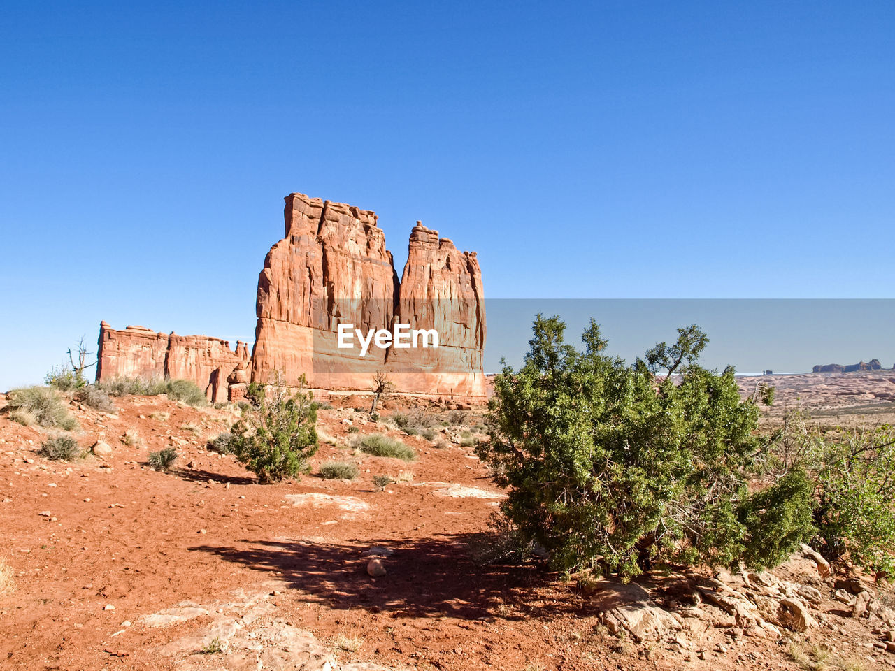 ROCK FORMATIONS AGAINST CLEAR SKY