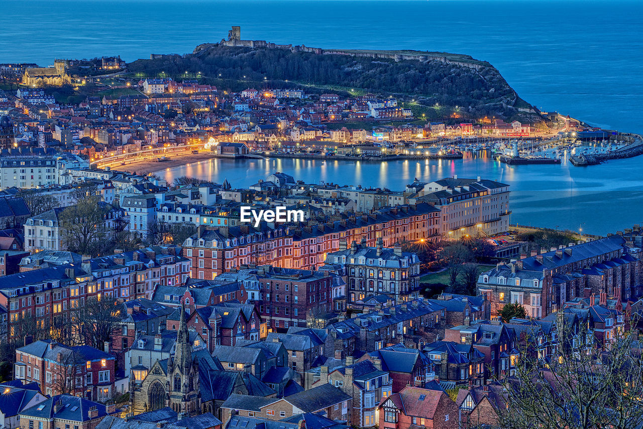 Seafront in scarborough during blue hour.