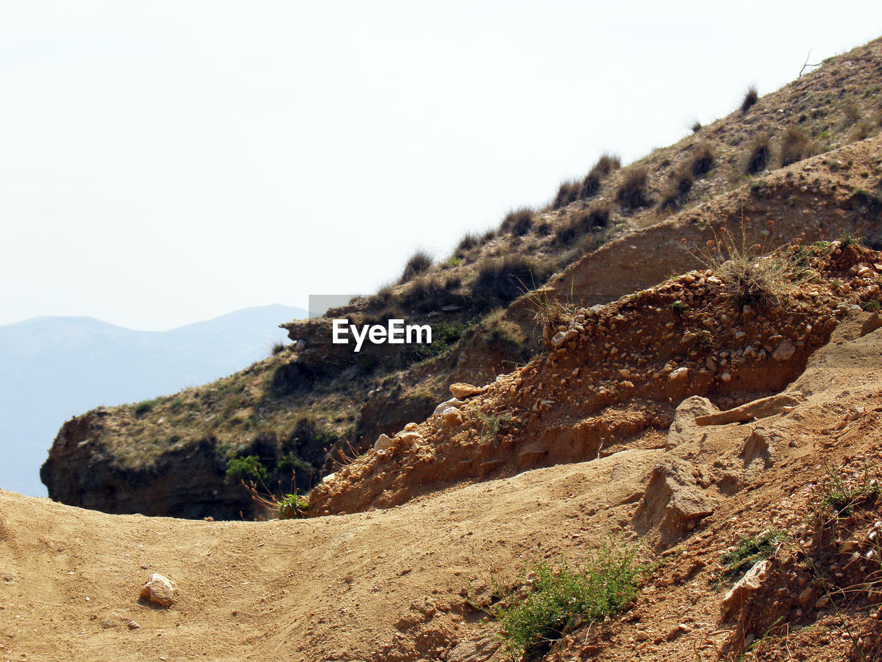 SCENIC VIEW OF MOUNTAIN AGAINST SKY