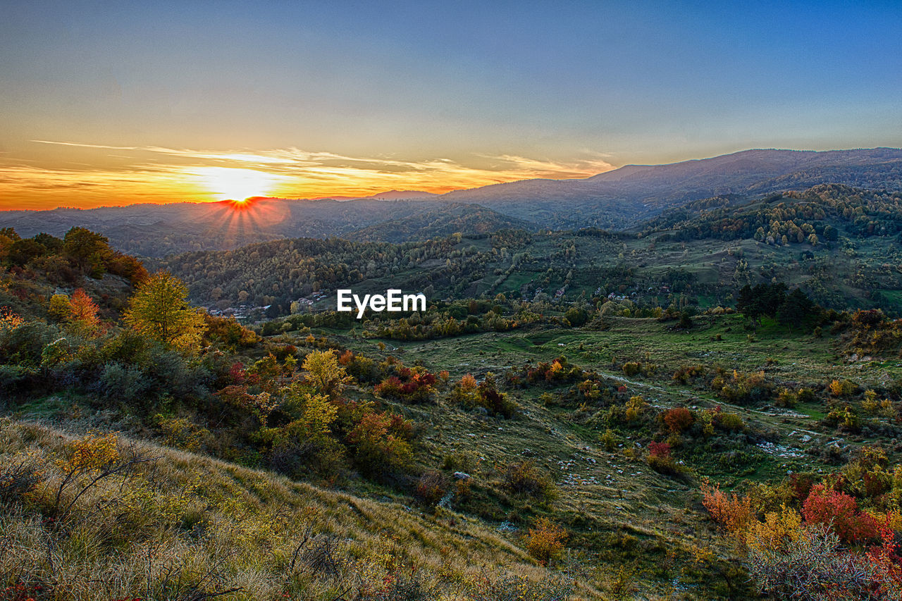 Scenic view of landscape during sunset
