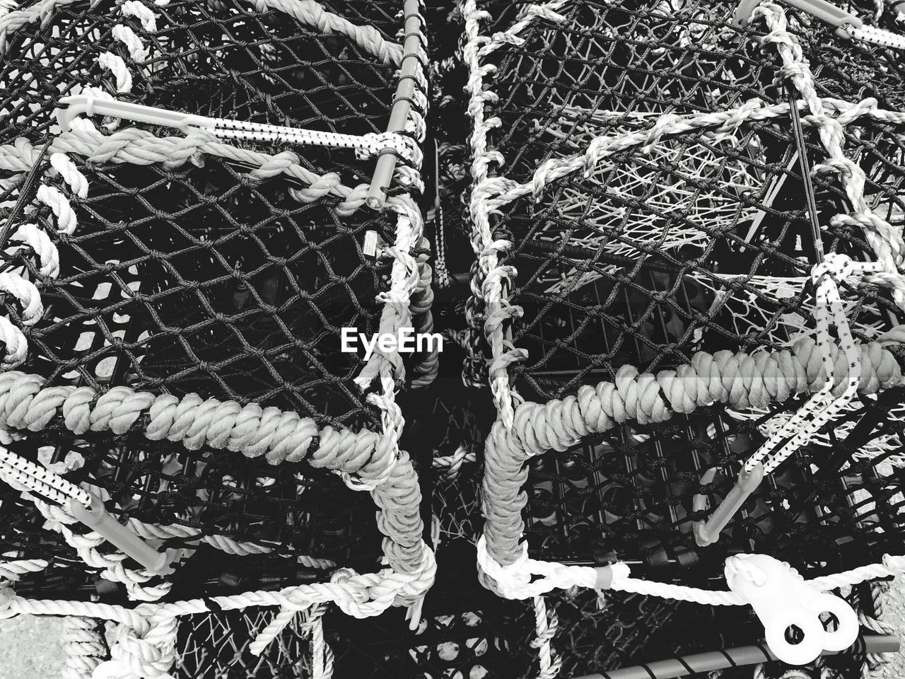 CLOSE-UP HIGH ANGLE VIEW OF FISHING NETS