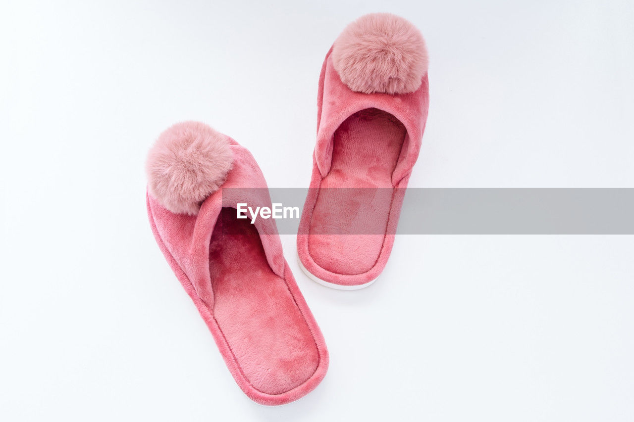 pink, footwear, shoe, human leg, limb, studio shot, white background, cut out, petal, indoors, magenta, heart, outdoor shoe, pair, close-up, hand