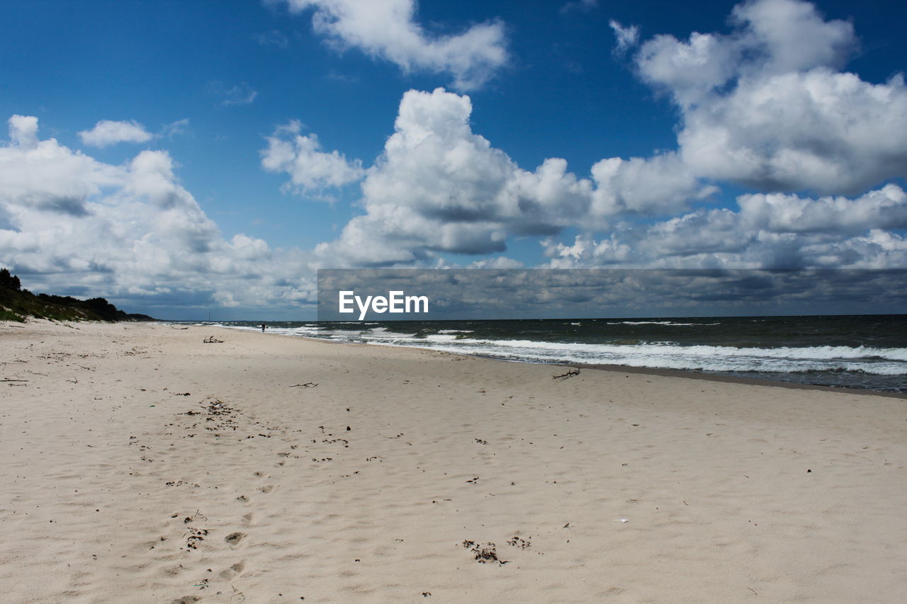 Scenic view of beach against sky