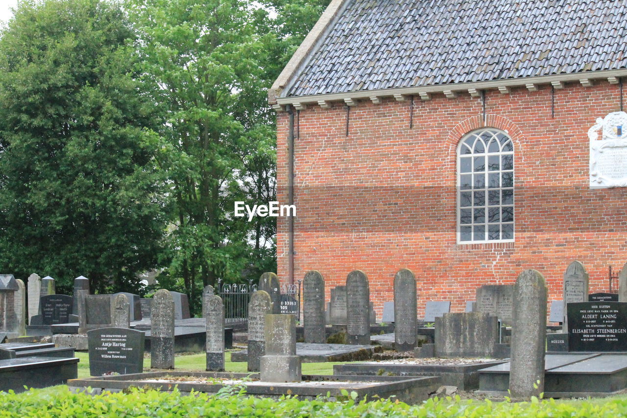 CEMETERY AGAINST BUILT STRUCTURES