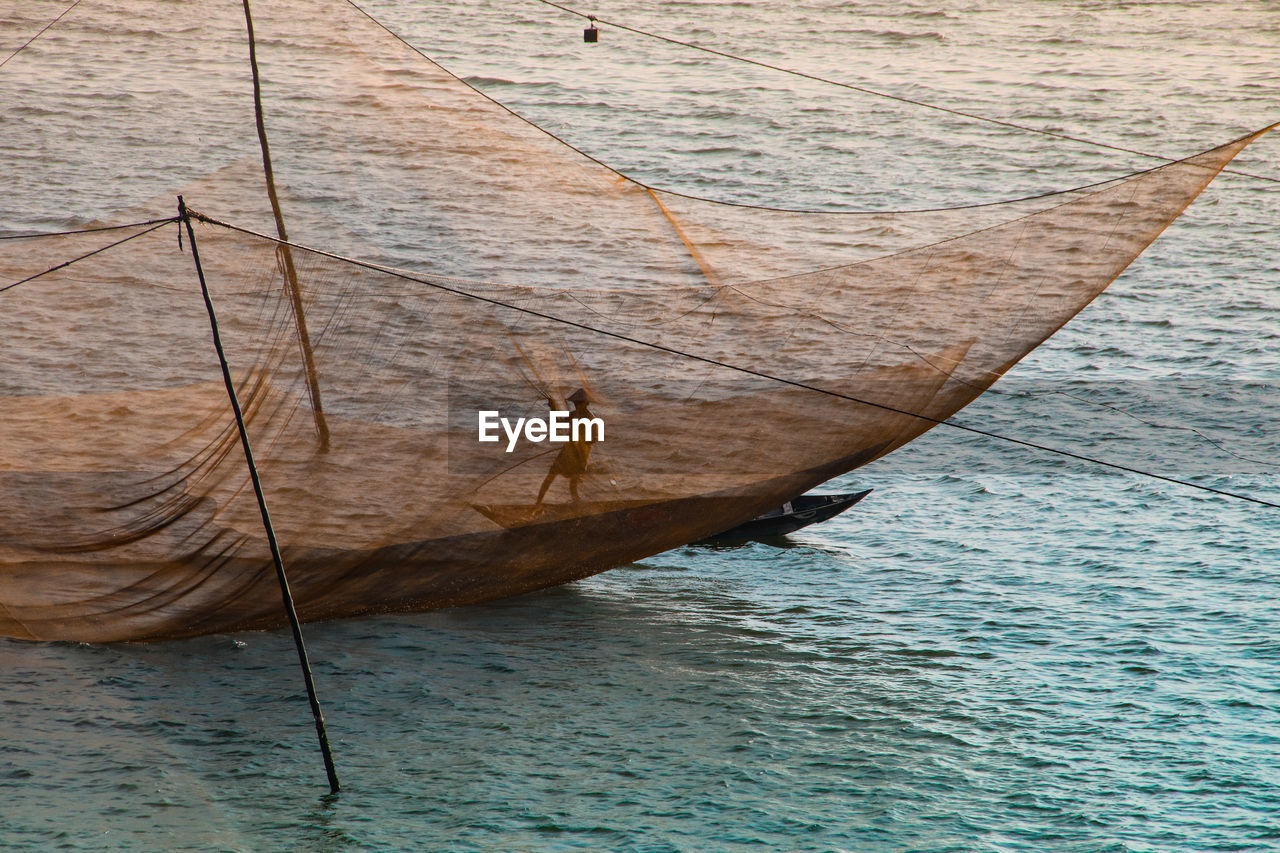 High angle view of fisherman in sea