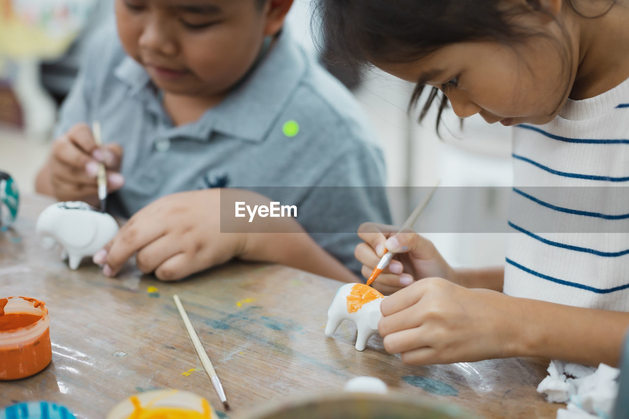 Cute kids painting toys