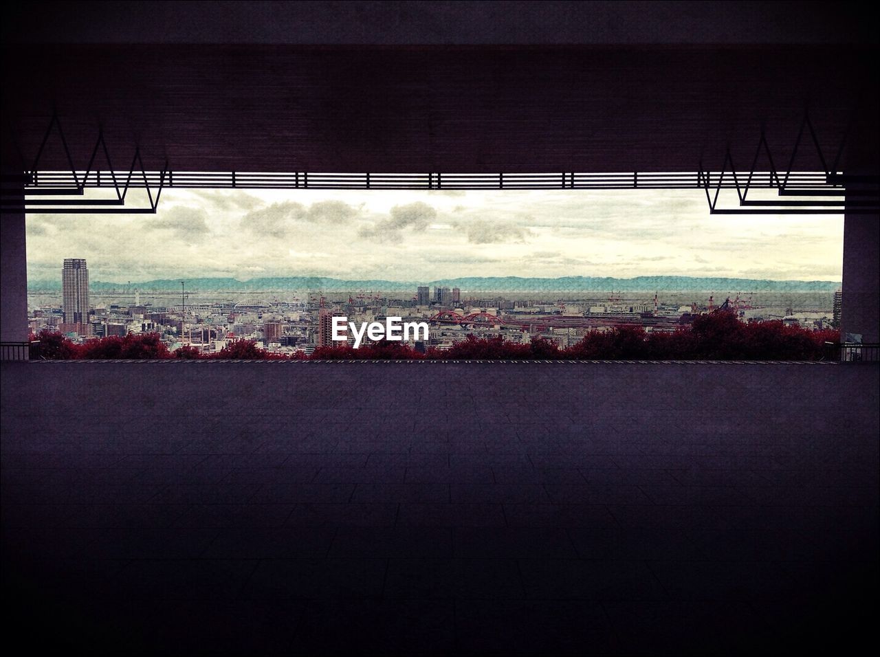 View of cityscape seen through building lobby