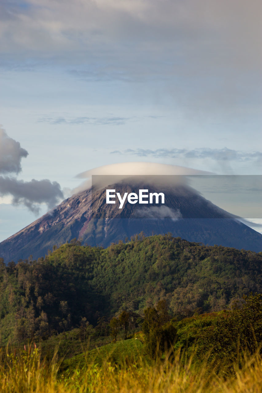 Volcanic mountain against sky 