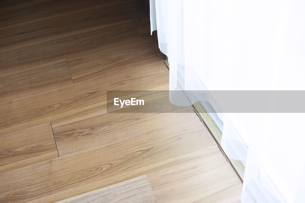 High angle view of hardwood floor in house