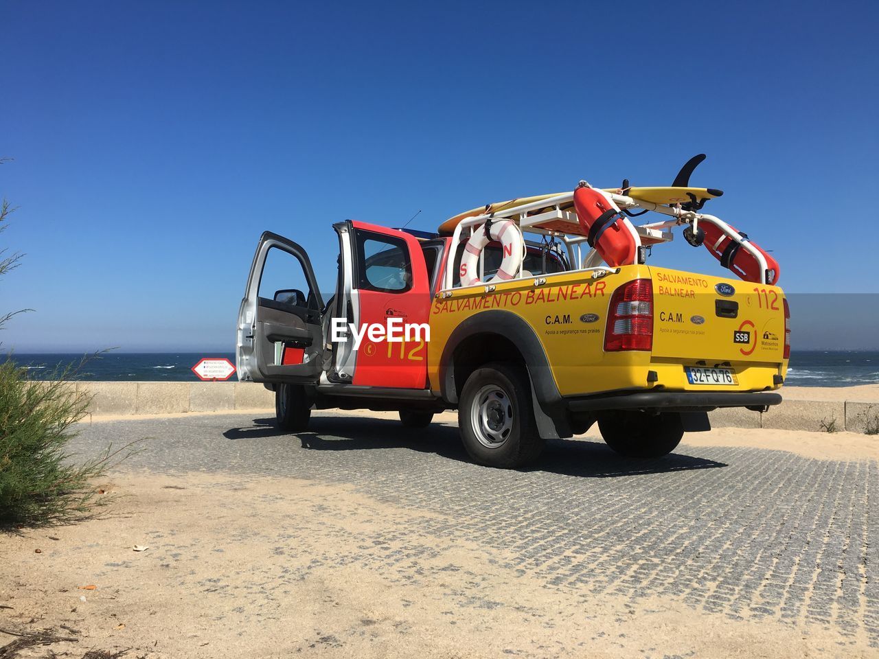 VINTAGE CAR ON BEACH