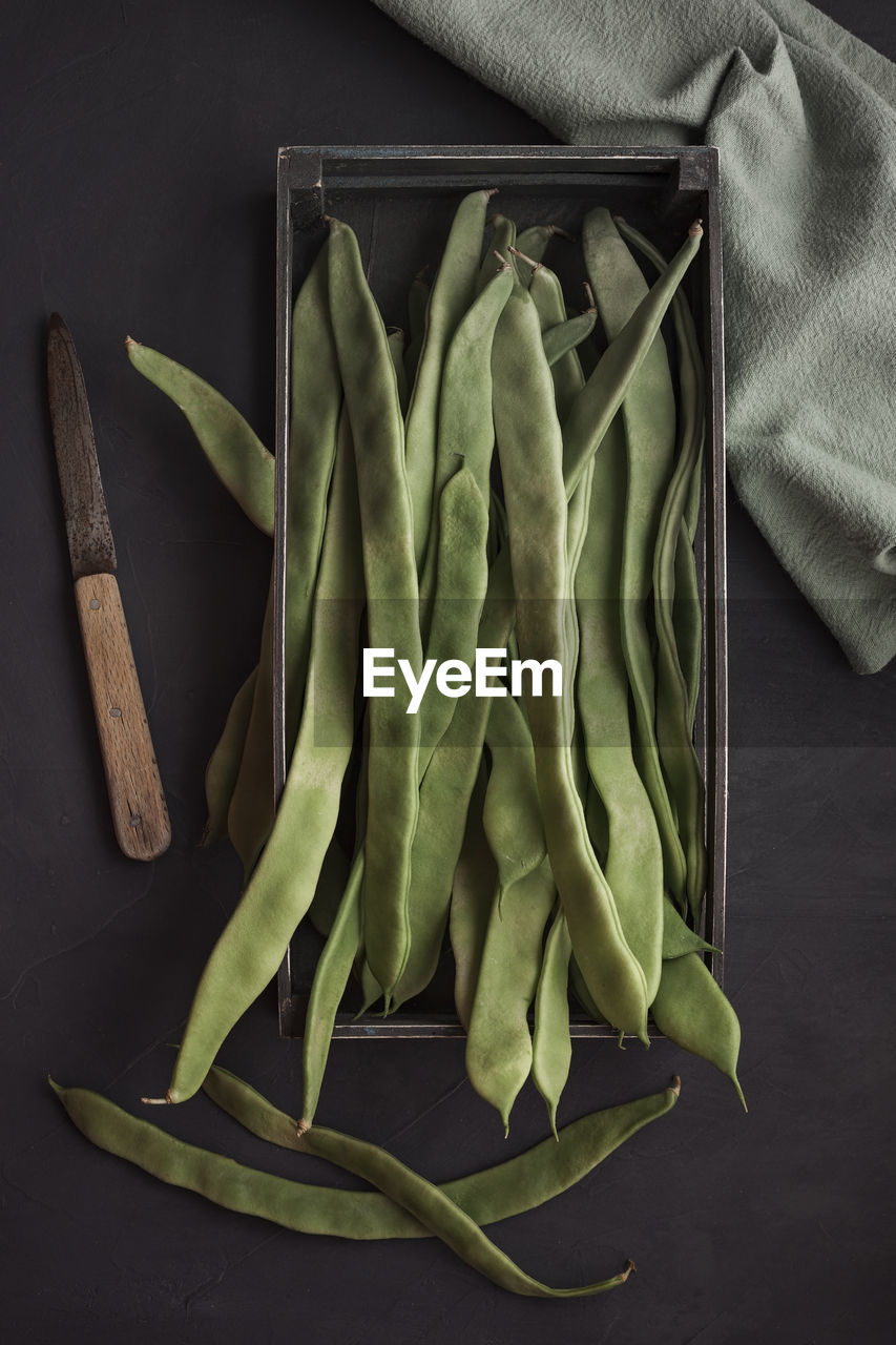 High angle view of flat beans on table