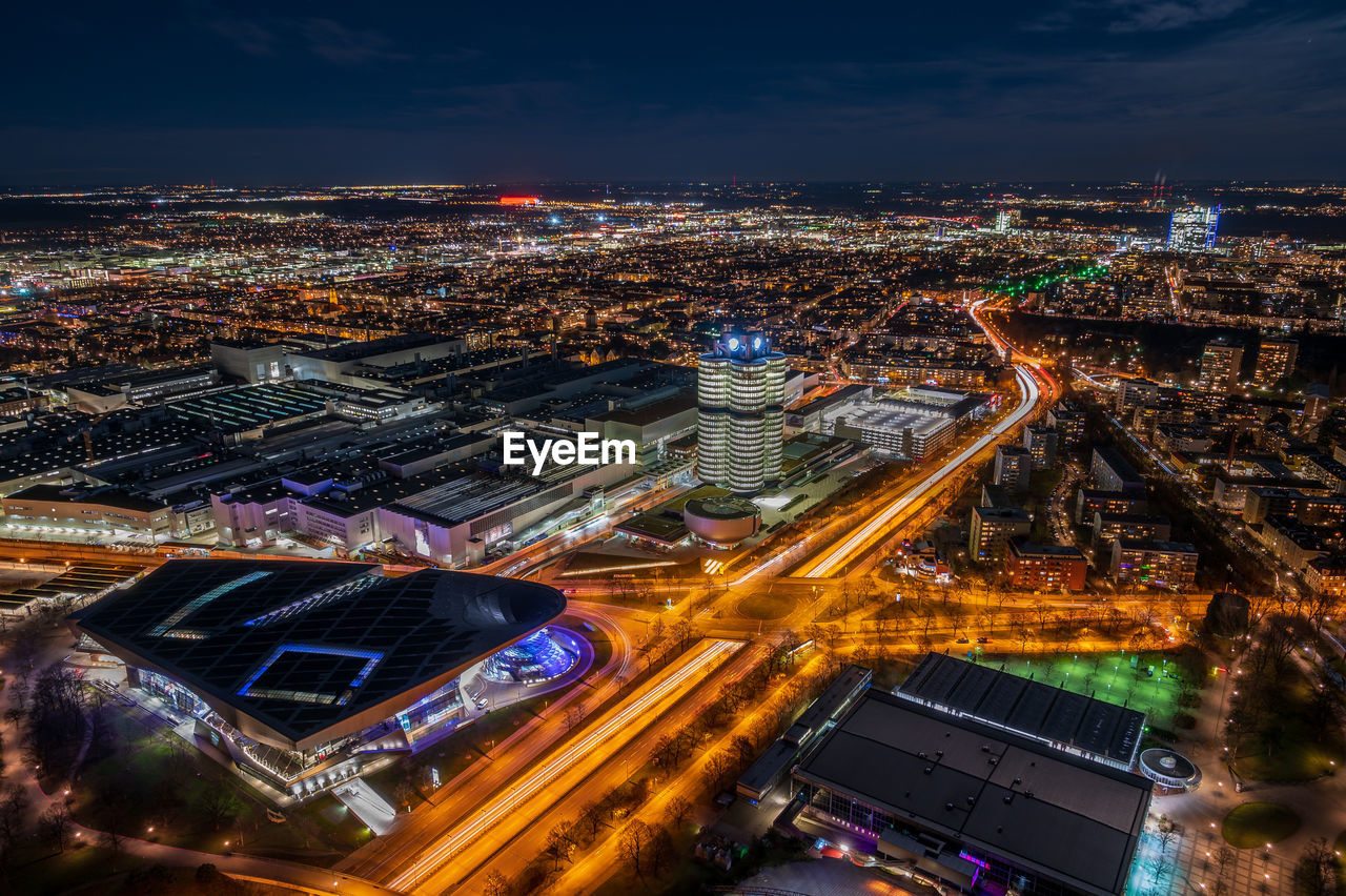 Aerial view of illuminated cityscape at night