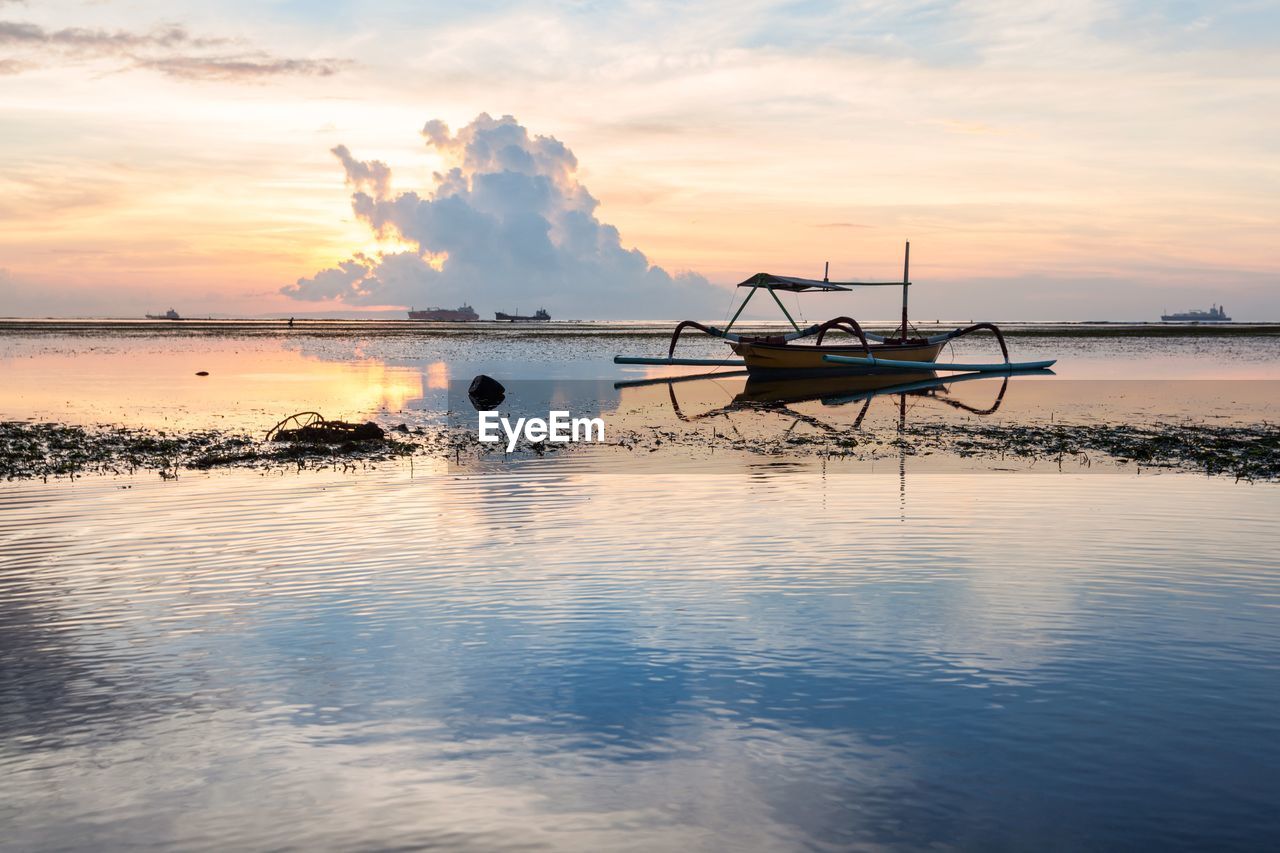 SCENIC VIEW OF SEA DURING SUNSET