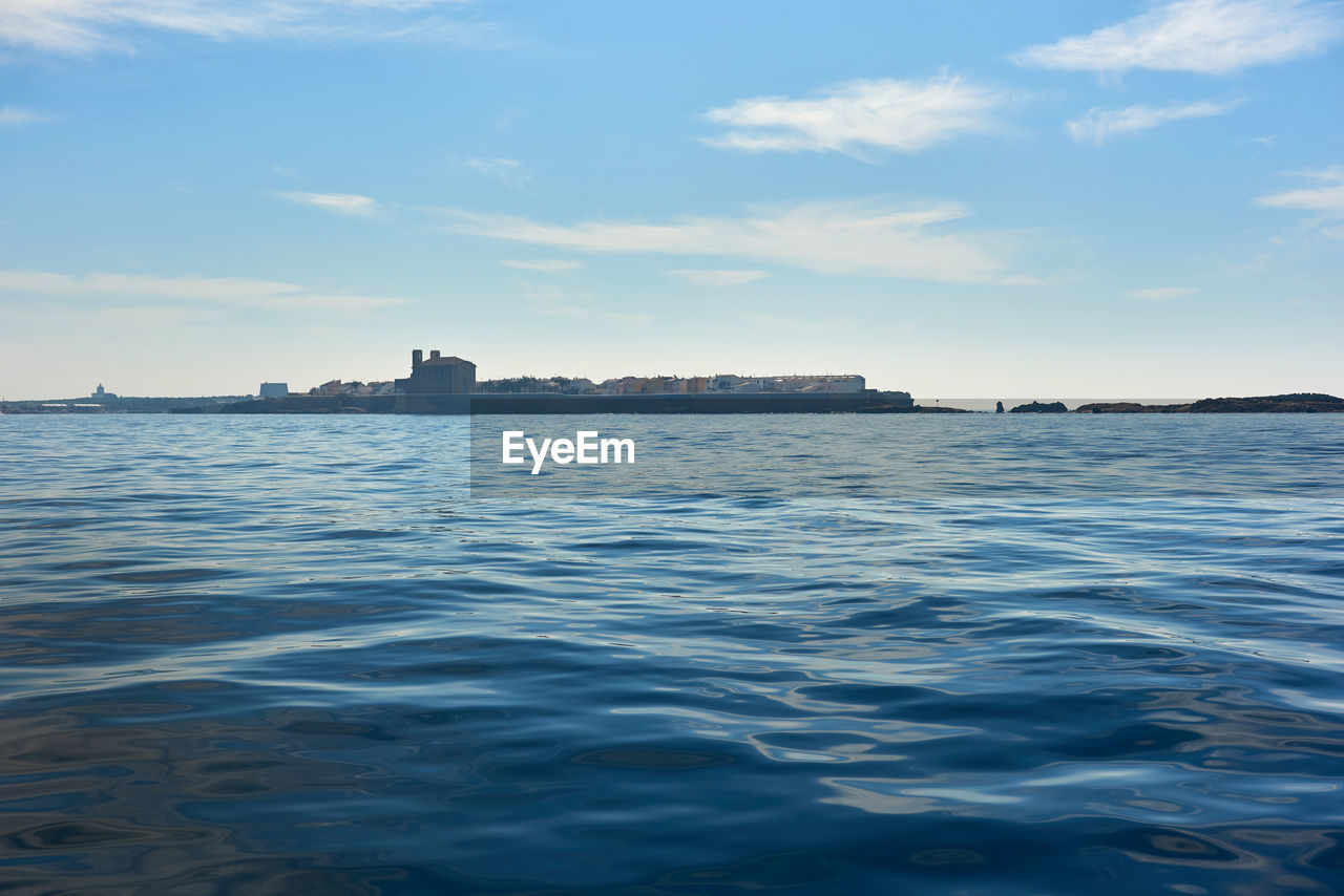 Scenic view of island against sky