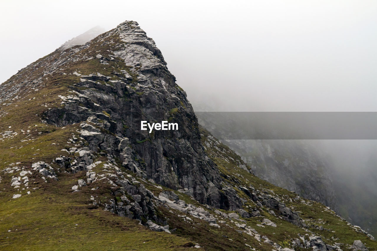 Mountain peak in foggy weather