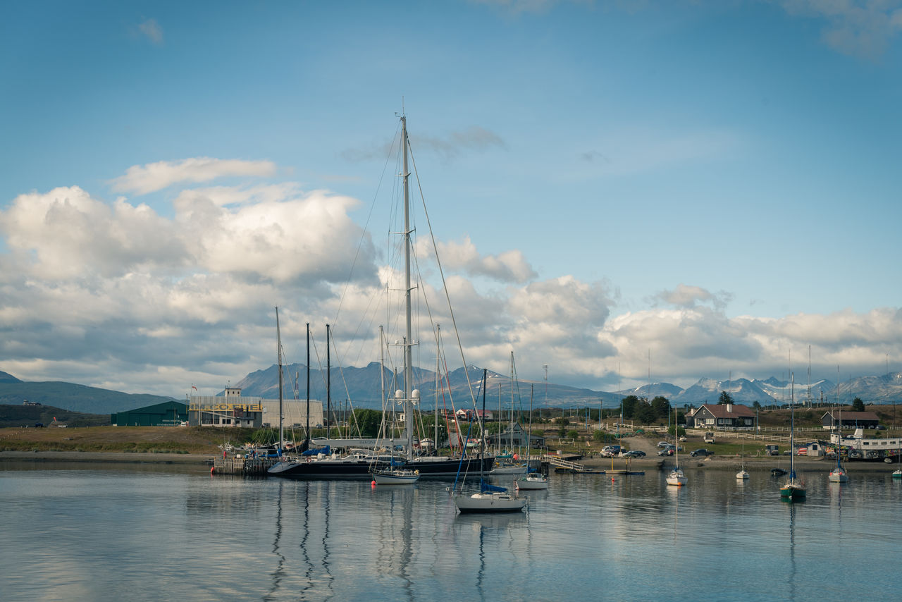 BOATS MOORED IN HARBOR