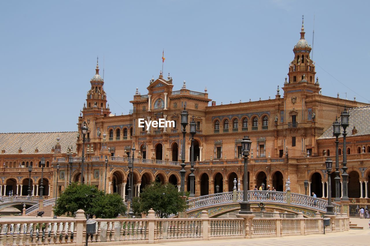 Low angle view of historic building against clear sky in spain