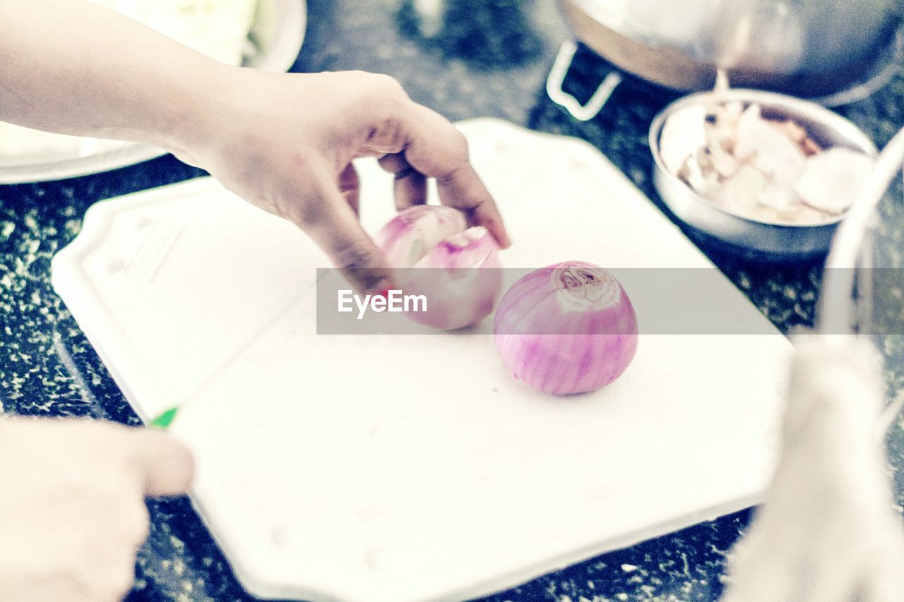 Close-up of woman preparing food