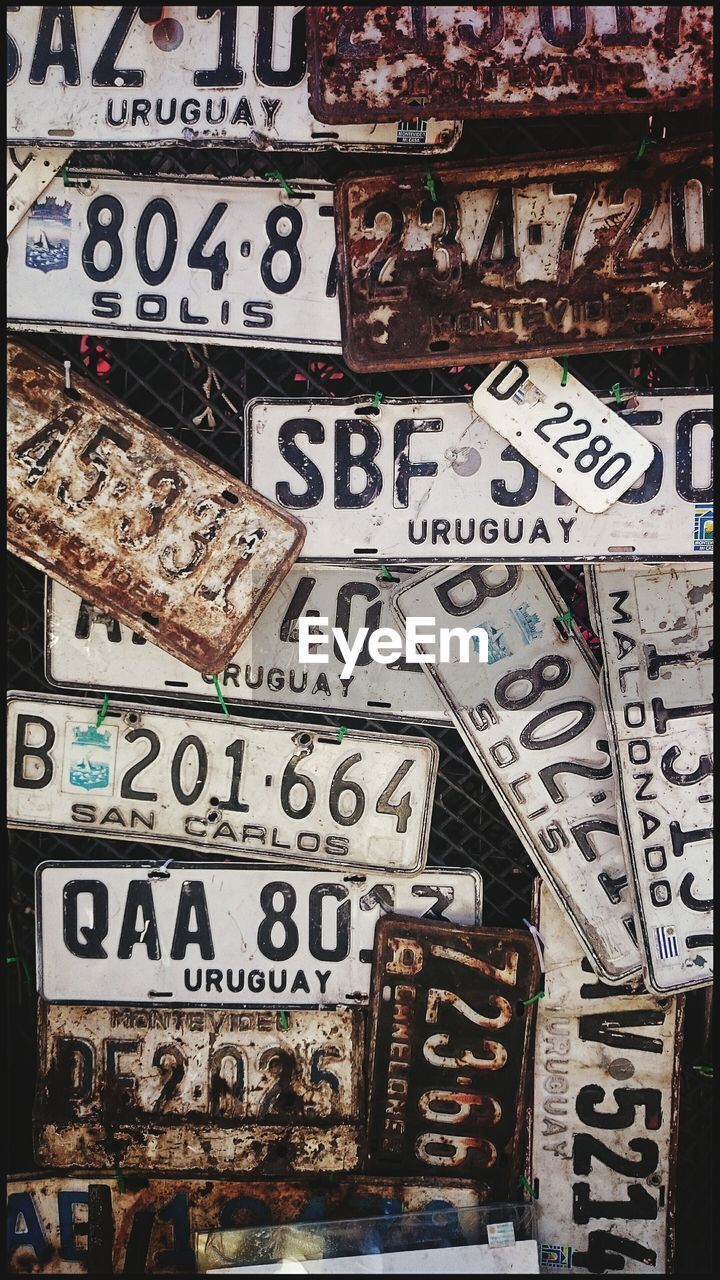 Close-up of abandoned rusty license plates