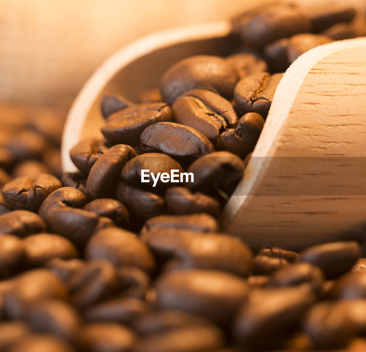 close-up of roasted coffee beans on table