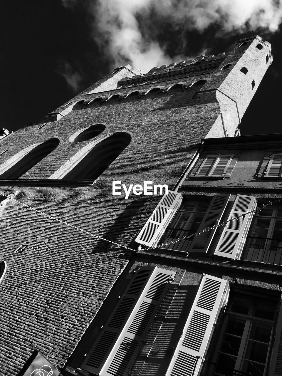 Low angle view of buildings against sky in city