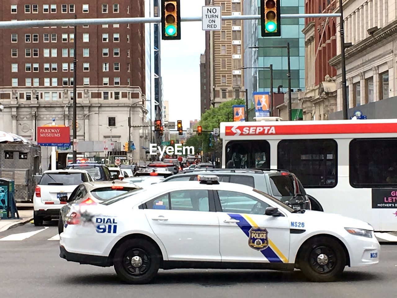 VEHICLES ON STREET IN CITY