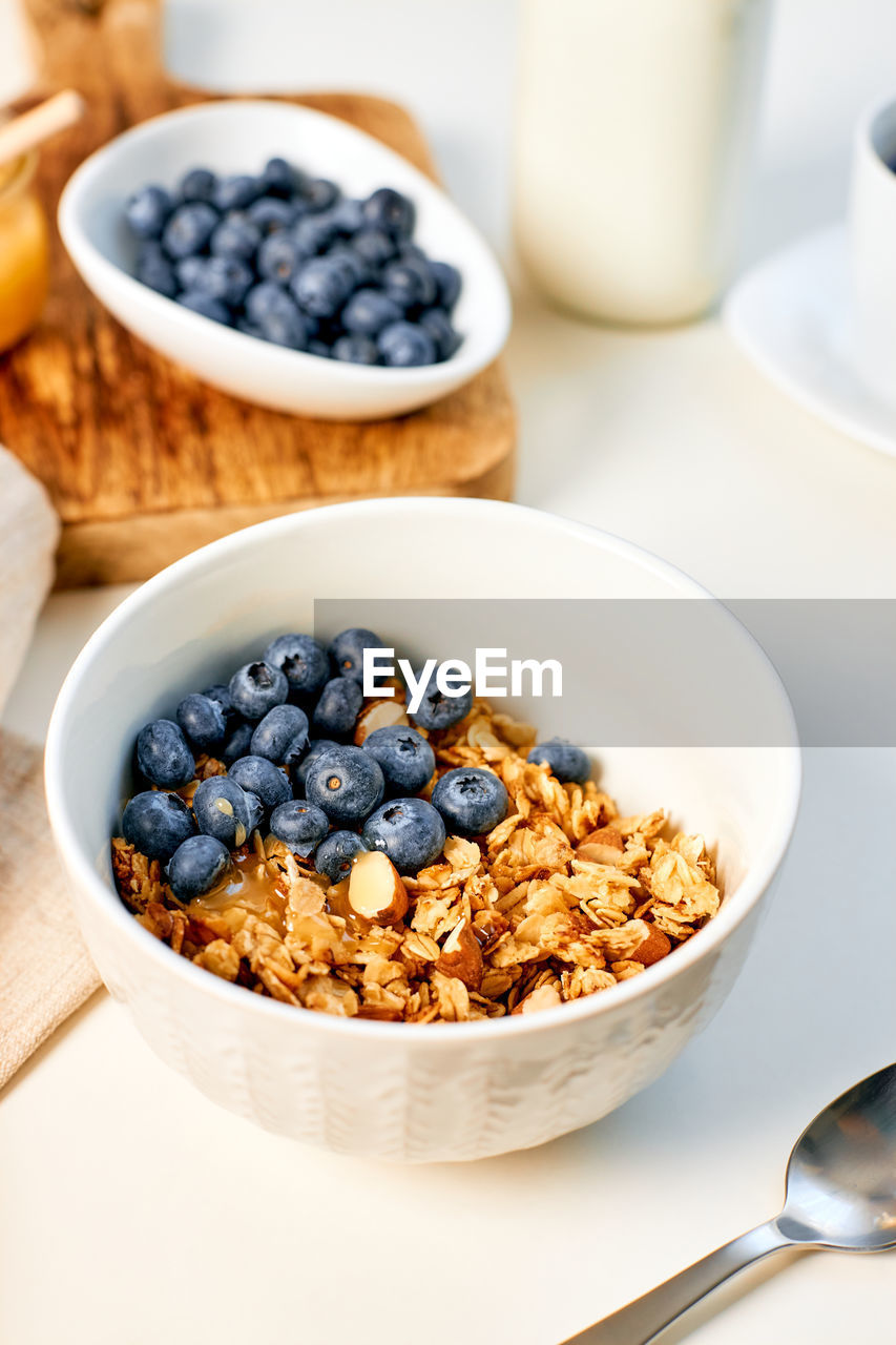 Homemade granola with nuts and fresh berries for breakfast. proper balanced nutrition. food 