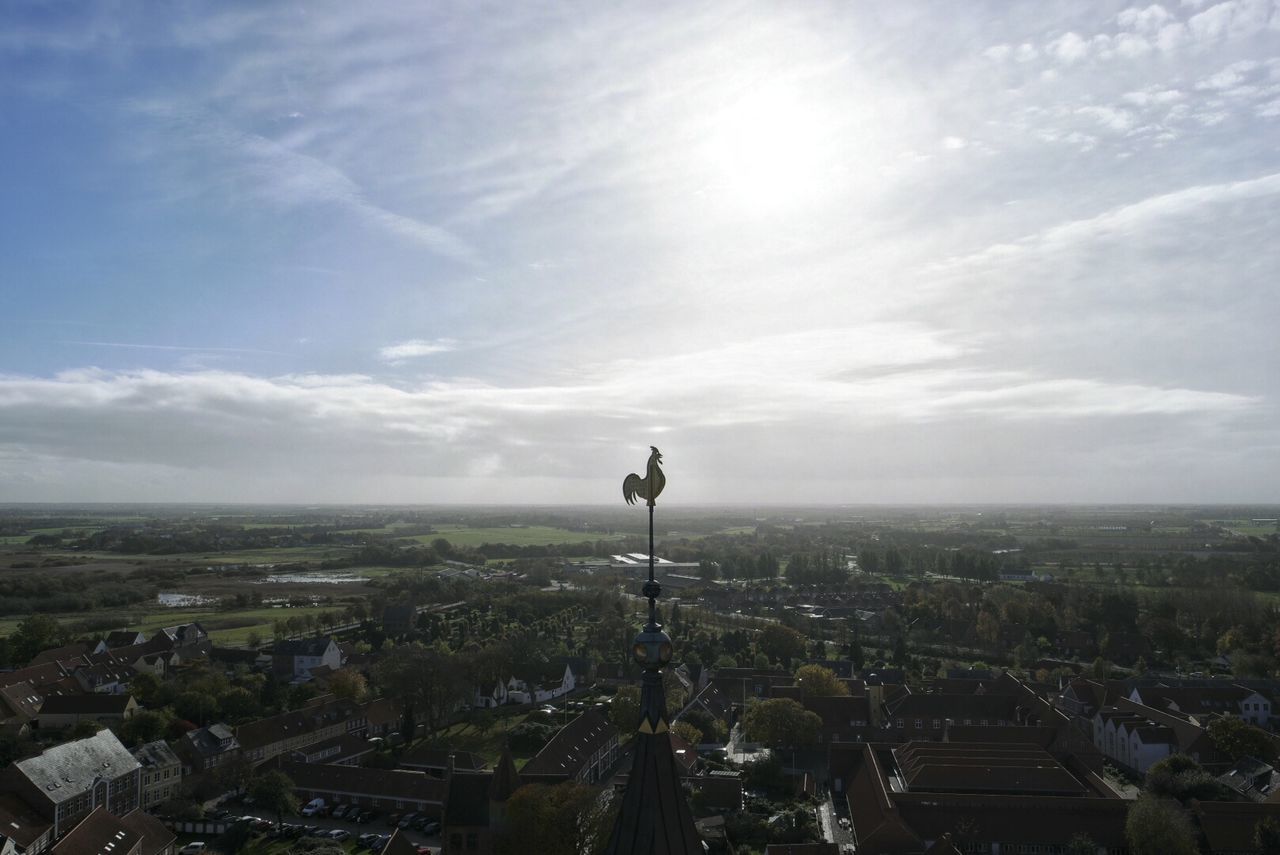 Aerial view of cityscape against sky