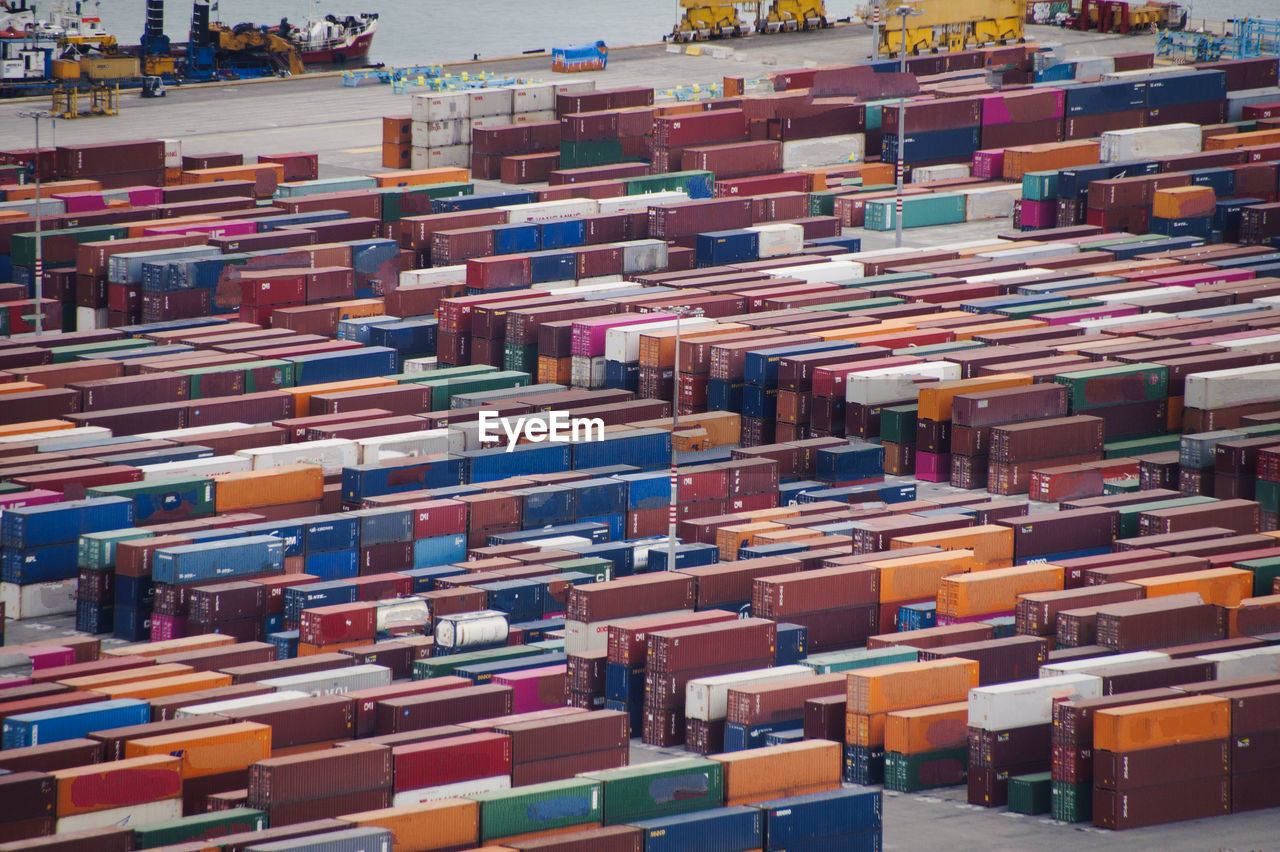 High angle view of cargo containers at commercial dock