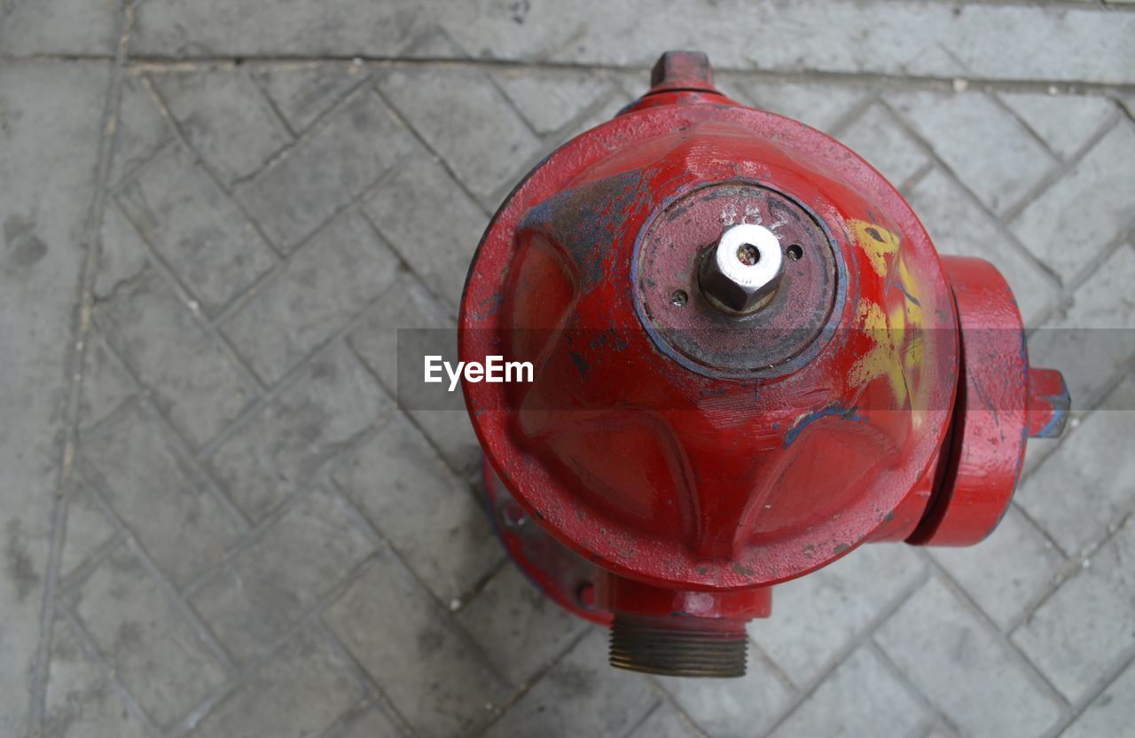 High angle view of fire hydrant on sidewalk