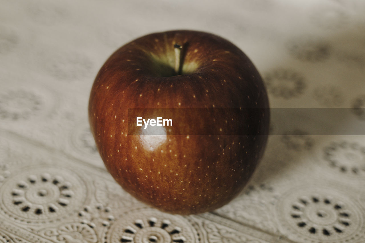 Close-up of apple on table