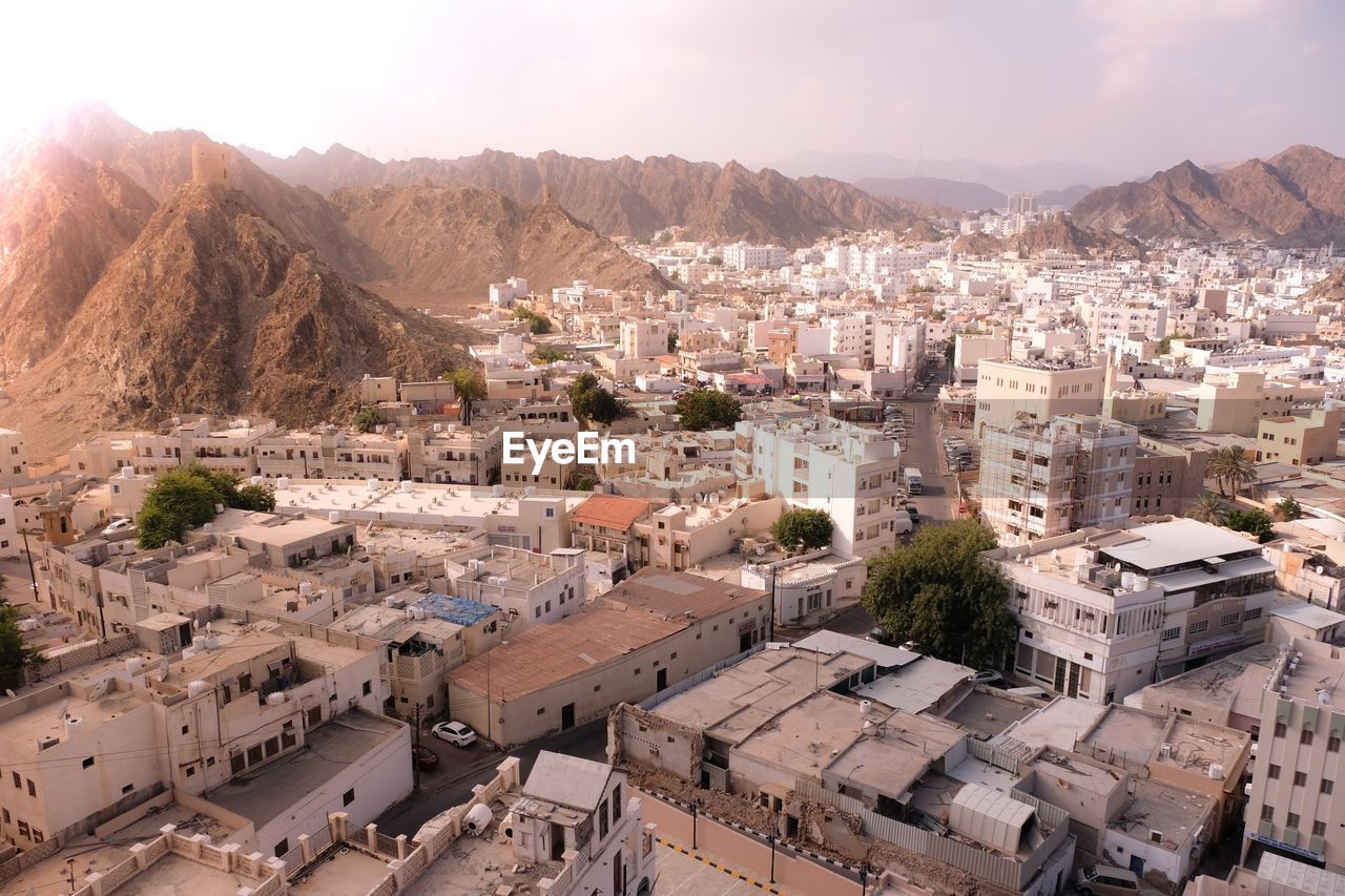 HIGH ANGLE VIEW OF BUILDINGS IN CITY