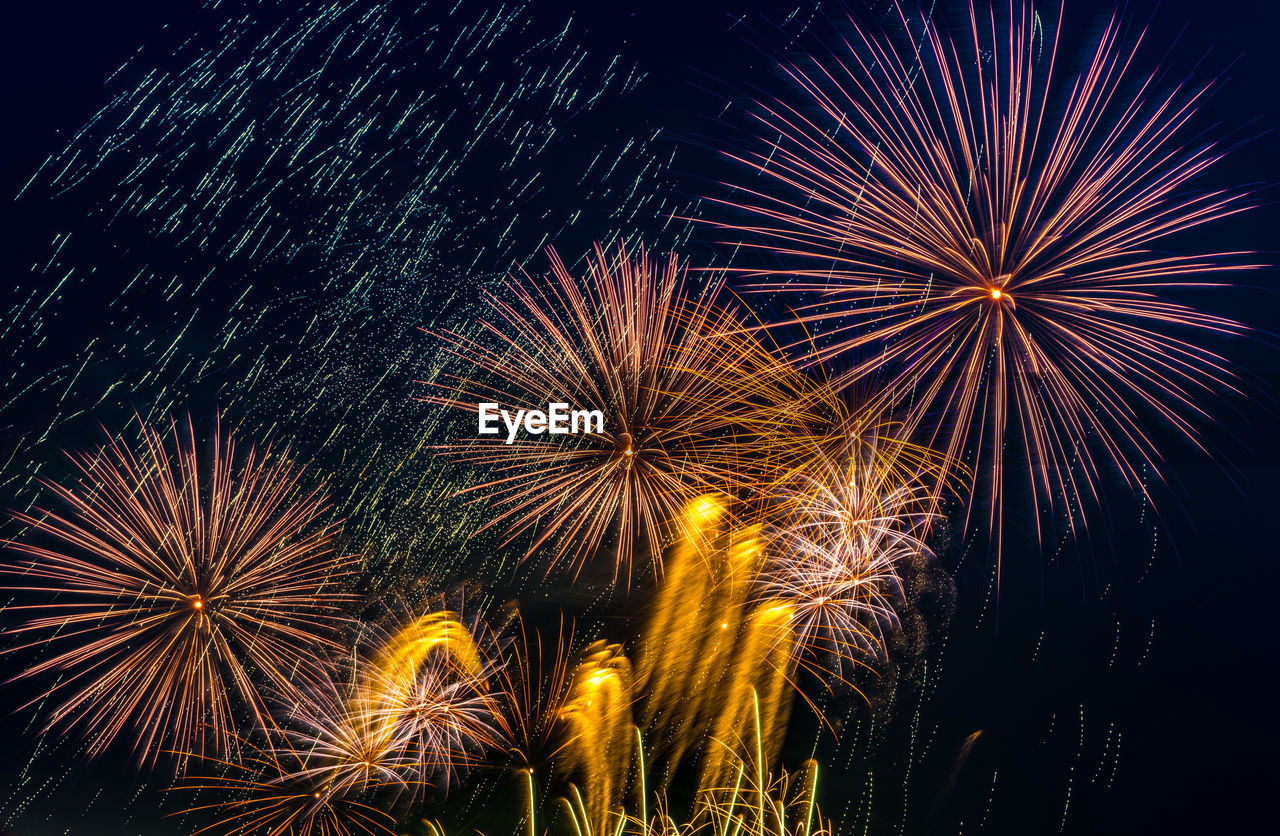 Low angle view of sky illumed with fire crackers