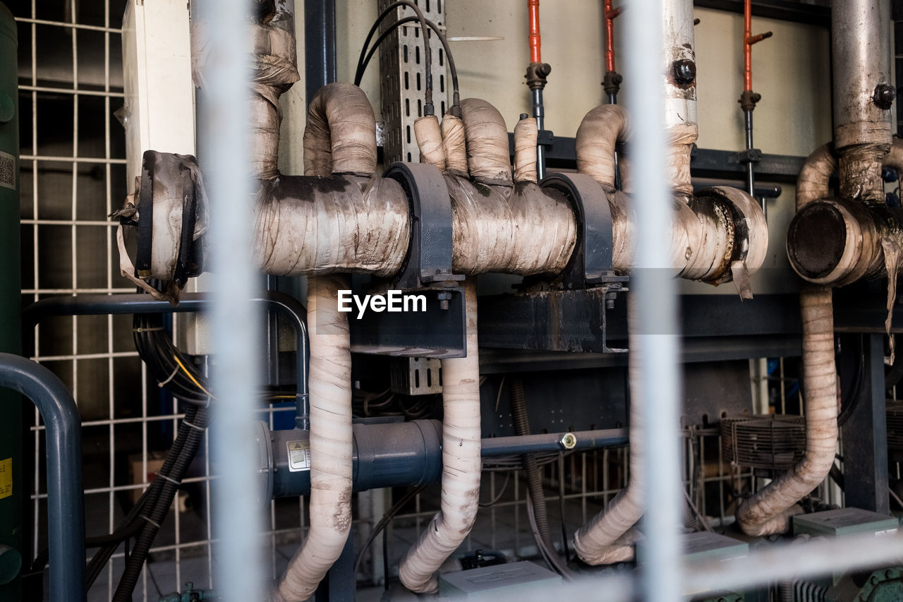 Close-up of pipes in factory