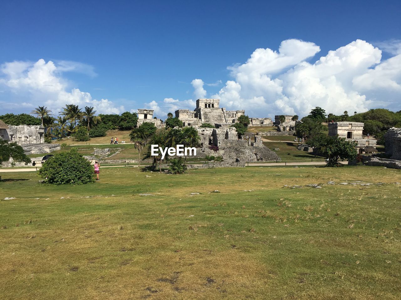 Built structure on landscape against sky