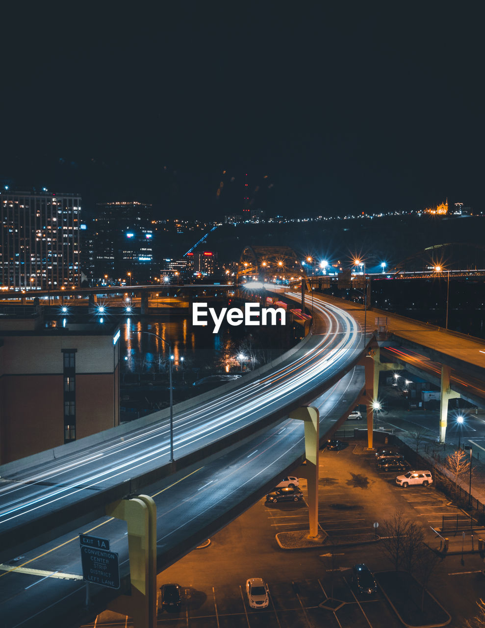 High angle view of light trails on road at night