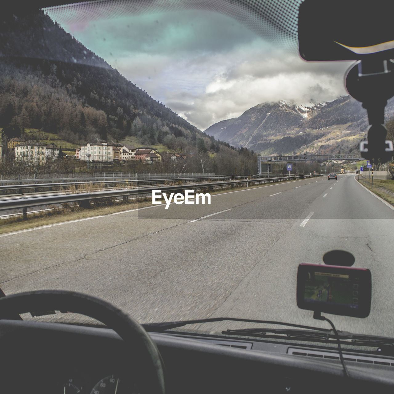 ROAD PASSING THROUGH MOUNTAINS