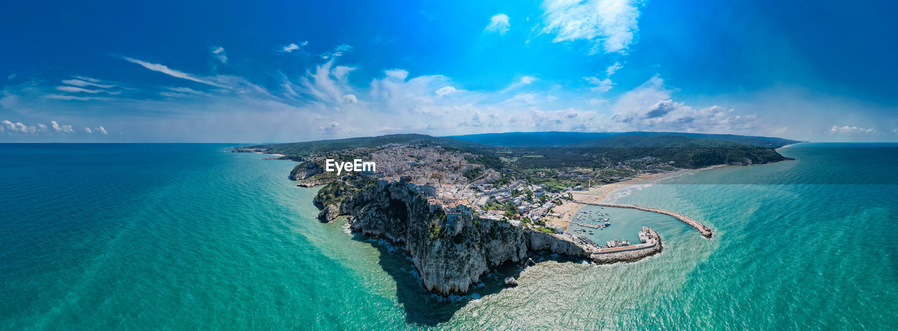 PANORAMIC VIEW OF BAY AGAINST CLEAR SKY