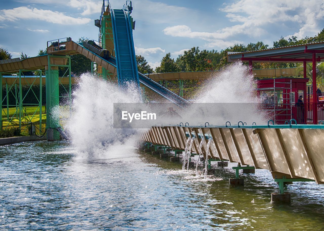 WATER SPLASHING AGAINST BRIDGE