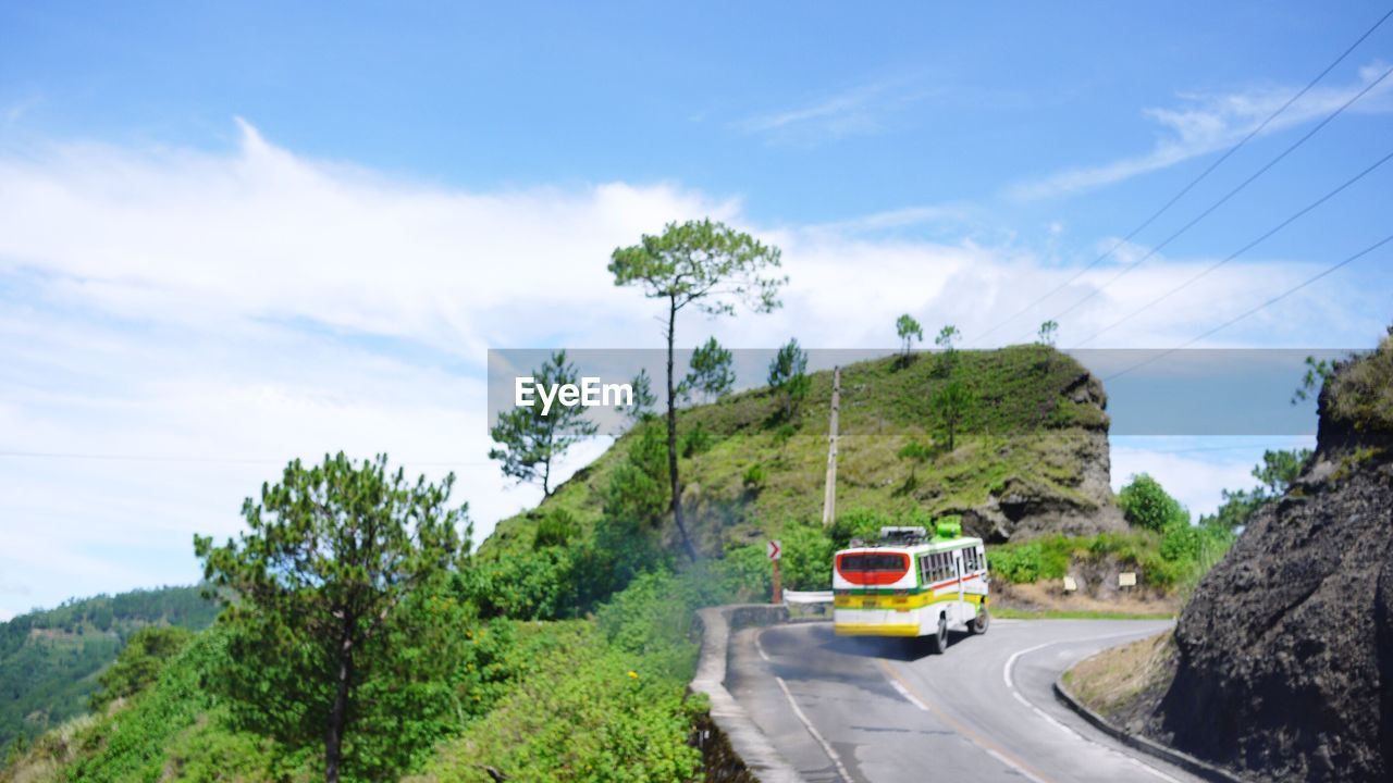 ROAD PASSING THROUGH LANDSCAPE