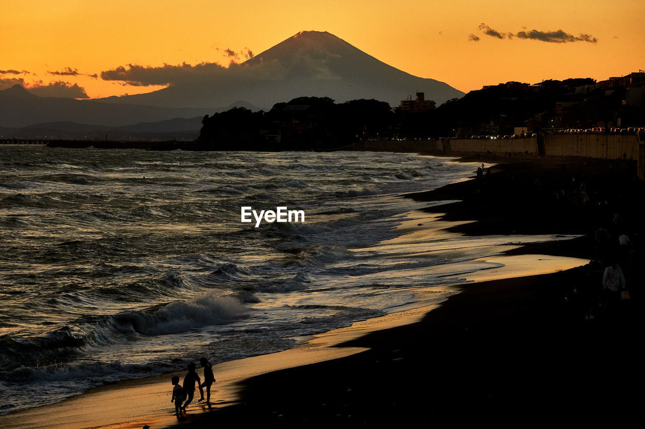 Scenic view of beach during sunset