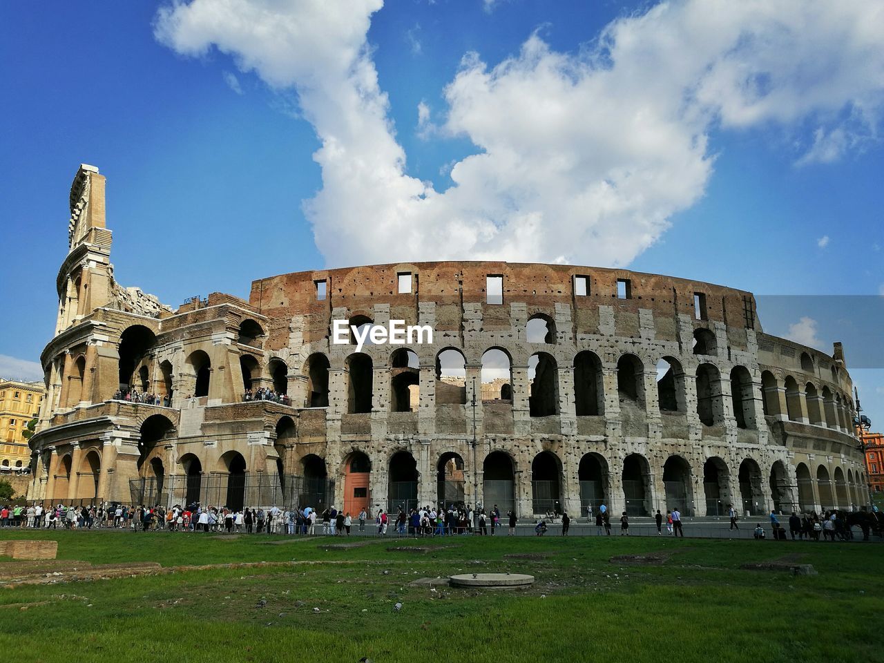 Low angle view of coliseum against sky