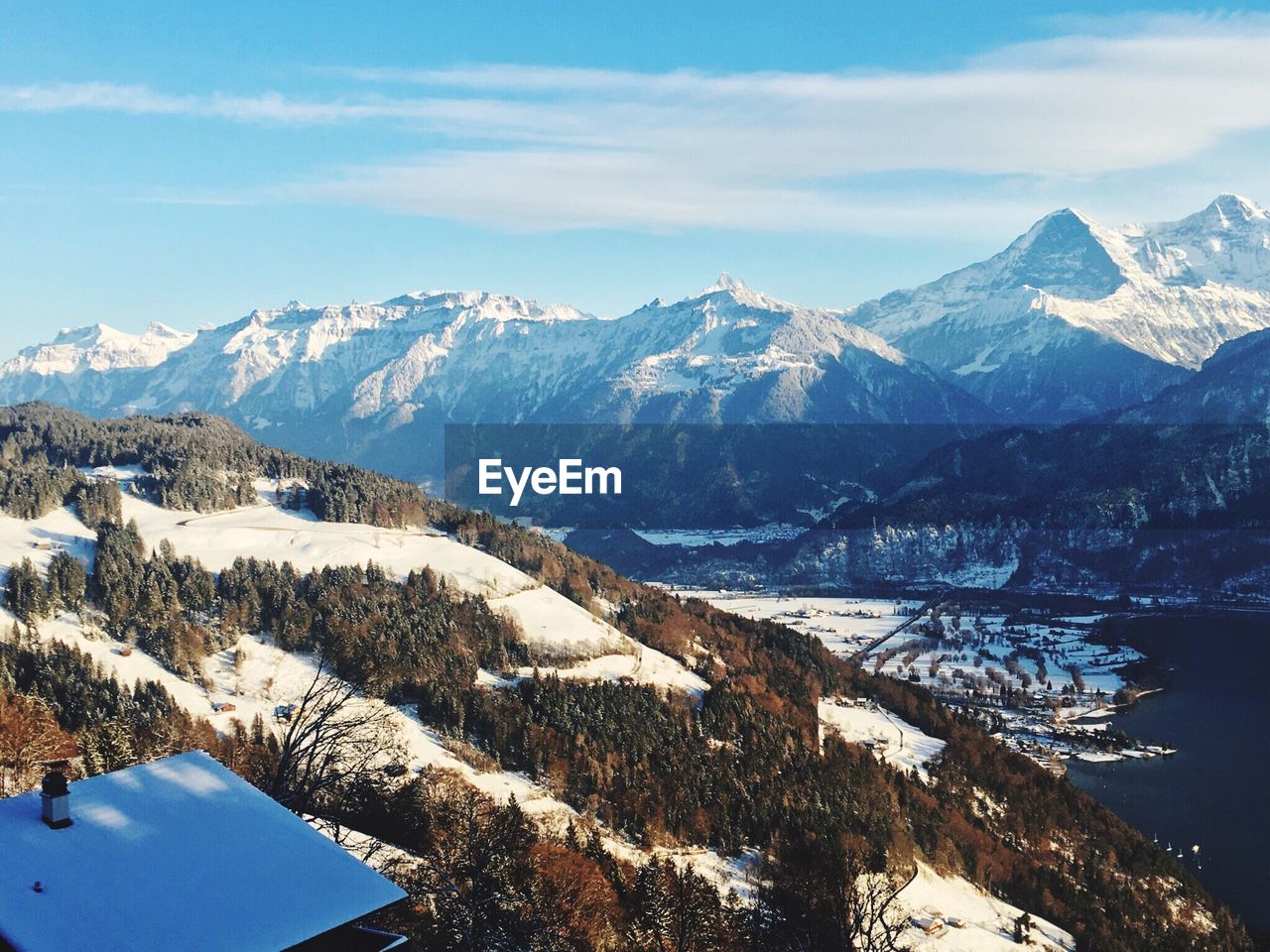 Scenic view of snowcapped mountains against sky