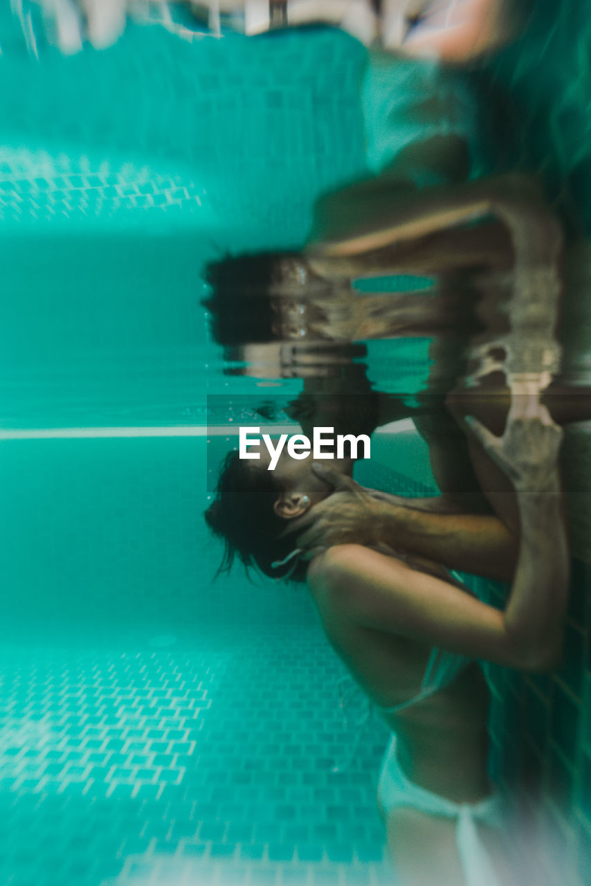 Woman swimming in pool