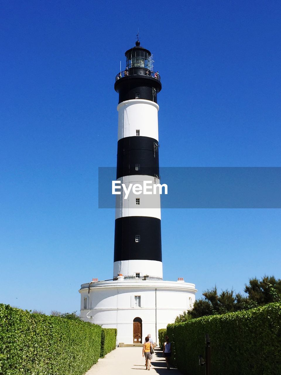 Low angle view of lighthouse against clear sky