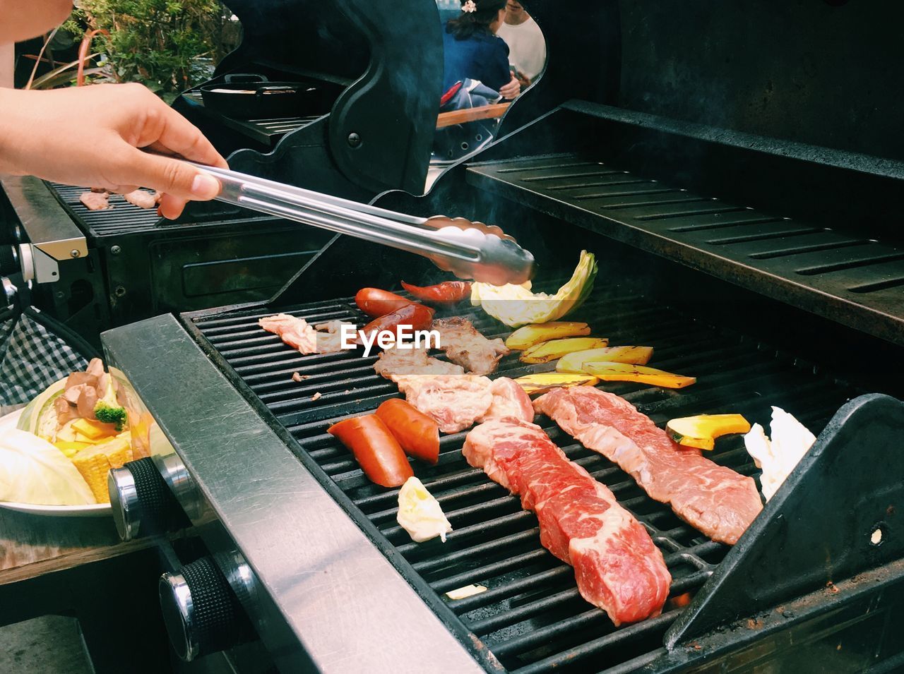 Close-up of meat on barbecue grill