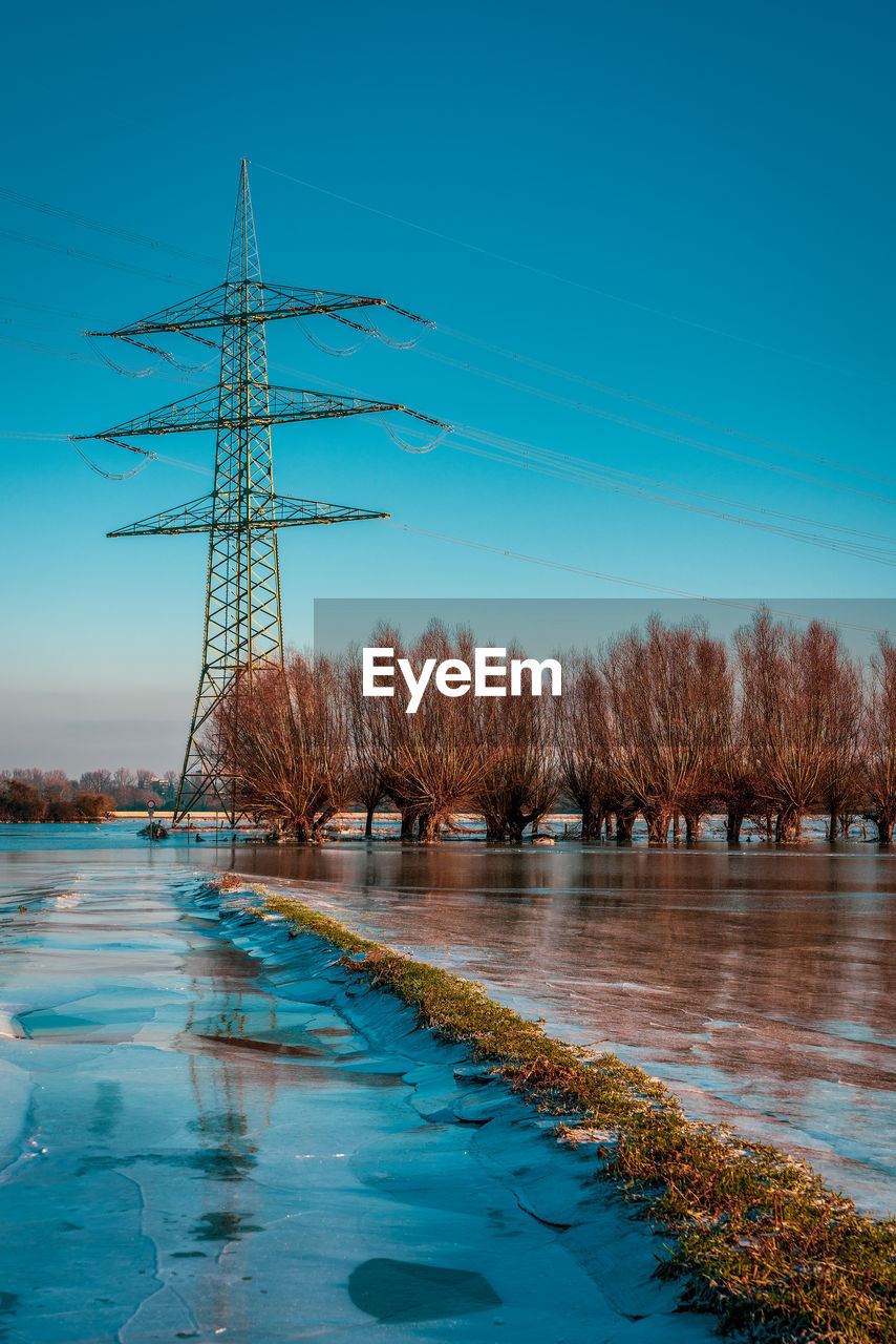 Frozen field and trees after flooding, germany,