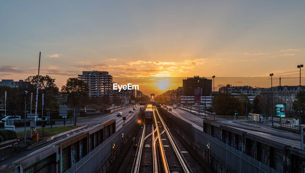 High angle view of traffic on city during sunset