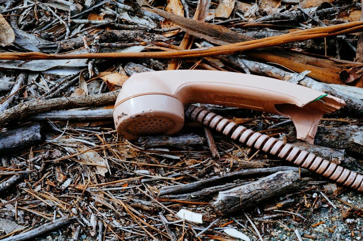 Close-up of an abandoned telephone receiver